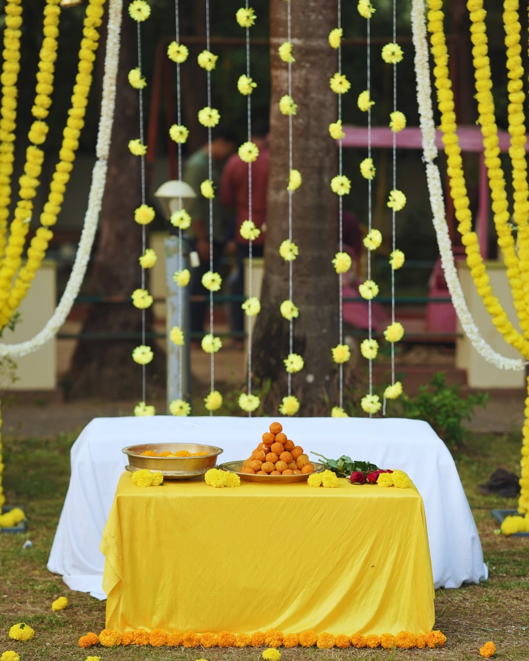 Marigold strands and ritual table